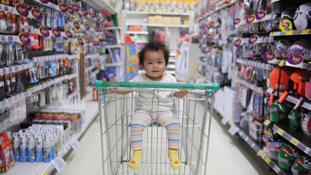 Child in shopping cart for buyers journey